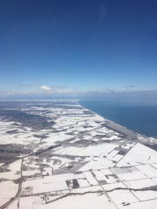 機上からの帯広の大地は銀世界