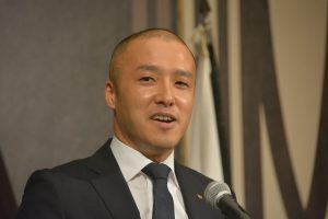 石川和孝常任理事による挨拶 ダボス会議で日本の道徳教育を世界に広げていくプロジェクトがあり、大分ＪＣの中島土君がこのプロジェクトで重要な役割を果たしていることなどについてお話してくれました。